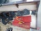 Long wood box with metal gun cleaning tins and other related gun items