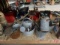 Metal pails with watering cans, oil cans, vintage iceskate blade, scale, hatchet,
