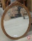 Wood framed wall mirror, 28inH