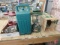 Coleman lights and heaters, two green plastic Coleman containers are empty, and two Great Land