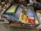 Floral trunk with sign, rugs, art pieces, cookbooks, lighted slide viewer, and more