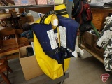 SeaLine dry bag Baja 55 and Sospenders inflatable safety vest, both