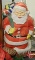 Vintage plastic outdoor candles, 45in, and santa, 30in, with pine-cones, as is