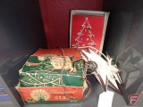 Vintage plastic and metal tree top stars with lighted Christmas tree