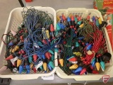 Vintage Christmas lights, mazda lamps, some on cloth cord, some with red wood beads