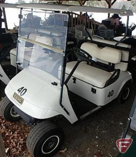 EZ-GO TXT 4-seater gas golf car with fold-down rear seat,