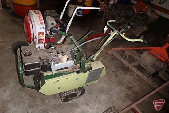 Cushman/Ryan Jr sod cutter with wire trenching attachment