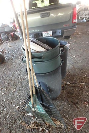 (4) Trash barrels and (3) rakes