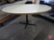 Oval table with metal base