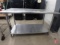 Tabco stainless steel table with under shelf and adjustable legs