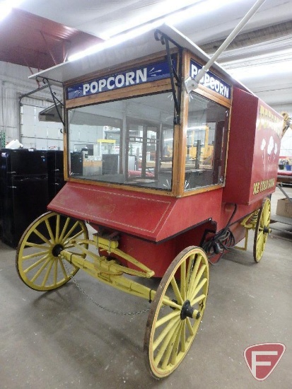 Vintage-style popcorn concession wagon, awning, lights, flagpole with American Flag,