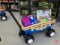Plastic wagon with plastic toys, helicopter, buggy, trucks, boat, and Verdes USA Map foam puzzle,