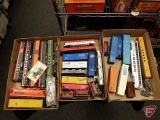 H.O. Model train cars: freight, passenger, coal, and parts, most cars in need of repair