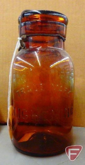 Canning/fruit jar, amber, Trade Mark Lightning, bottom marked Putnam 130,