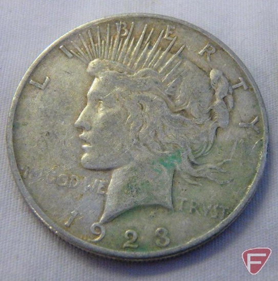 (4) Circulated 1922/23 Peace silver dollars
