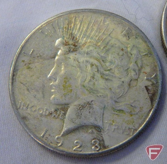 (4) 1923 Peace silver dollars, avg. circulated condition
