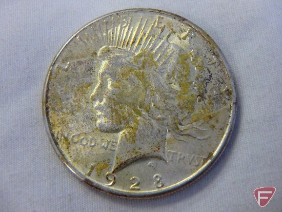 1923 Peace silver dollar, uncirculated, has some tape residue