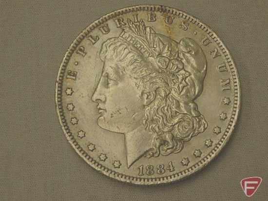1884 New Orleans silver dollar, AU55 to AU58