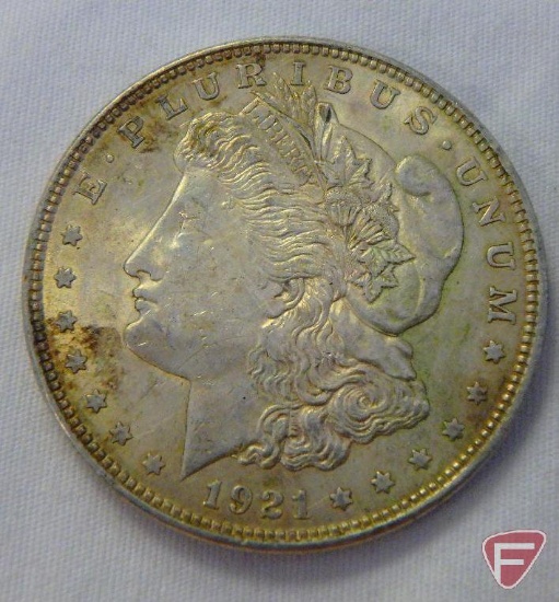 (3) 1921 Morgan silver dollars, all AU