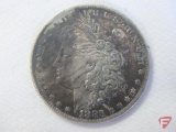 Nicely toned 1883 O Morgan silver dollar, AU condition