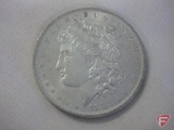 1883 Morgan silver dollar, AU to uncirculated, cleaned