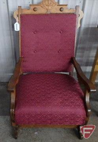 Vintage wood rocking chair with burgundy upholstery