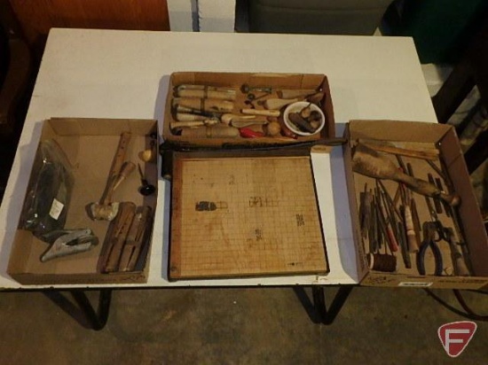 Various sizes of files and polishing tools. Includes drafting table