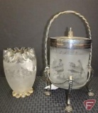 Frosted glass biscuit jar with etched horsemen in a silver-plated footed stand.