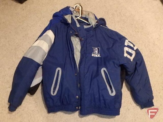 Duke Blue Devil quilted jacket, Size Large, and Orlando Magic quilted jacket , Size XL,