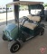 EZ-GO TXT electric golf car, green, no windshield, has canopy, rain curtain, charger, SN: 2211654