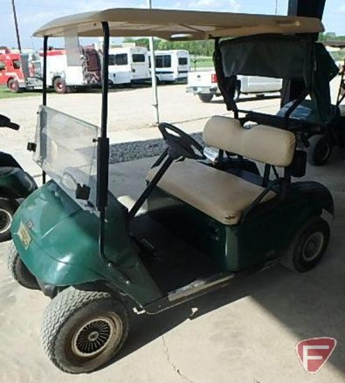EZ-GO TXT electric golf car, green, has windshield, canopy, rain curtain, charger, SN: 1534398