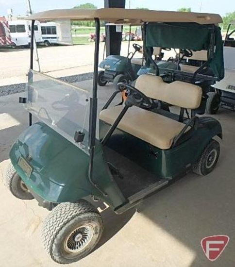 EZ-GO TXT electric golf car, green, has windshield, canopy, rain curtain, charger, SN: 1534738