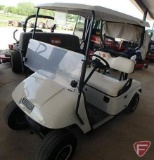 EZ-GO TXT electric golf car, white, has windshield, canopy, rain curtain, charger, SN: 2624656