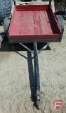Utility trailer on single axle, wood sides, and wood bed, box measures 4 ft. W x 5 ft. L