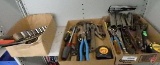 Pipe wrench, shears, cat's claw, screwdrivers, hammer, tape measure, sockets,