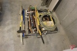 Contents of pallet: post hole pounder, pick axe, wood splitter, crowbar, shovel, window washing