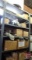 Contents of 6 shelves: electric motor rain shields, AO Smith external cooling fans, plastic caps,