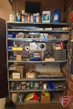 Shelf and contents: nylon washers, fiber washers, two-ear clamps, brass bushings, nuts