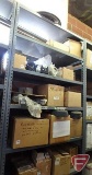 Contents of 6 shelves: electric motor rain shields, AO Smith external cooling fans, plastic caps,