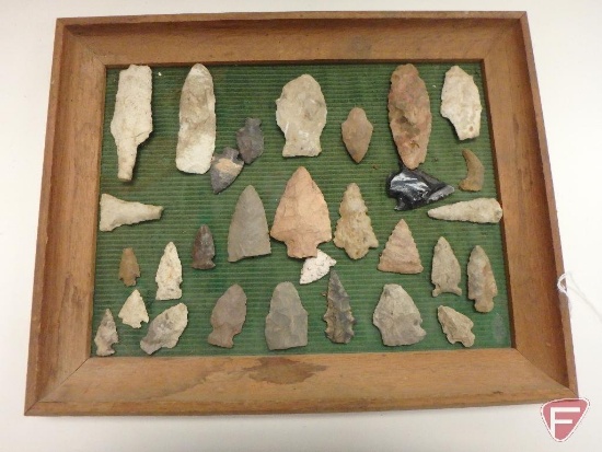 Various arrow heads attached to frame