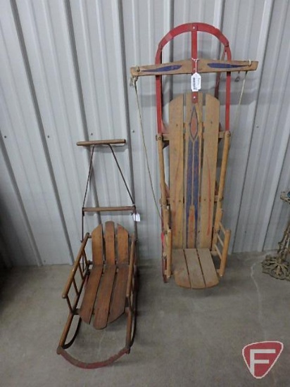 (2) vintage wood sleds with backs, larger one is 56in long and has rope pull,