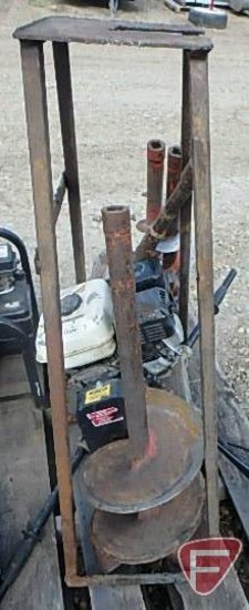 Groundhog earth drill with a Honda GX 160 5.5HP gas engine, (4) augers and stand