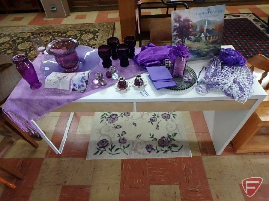 Ikea white table with 2 drawers and cord, 30inHx56inWx20inD and purple themed items,