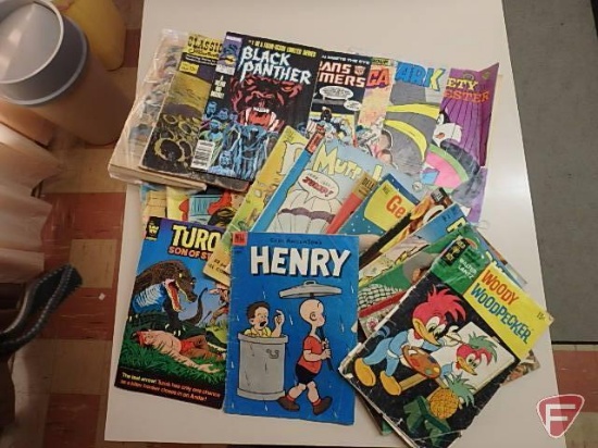 Vintage comic books, Black Panther, Tweety and Sylvester, Henry, Mickey Mouse. All 4 shelves