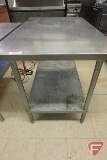 Stainless steel table with shelf and adjustable legs, 48inx30inx35-1/2in