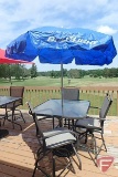 Patio table with glass top, (3) swivel chairs, blue vinyl umbrella with Bud Lite beer advertising