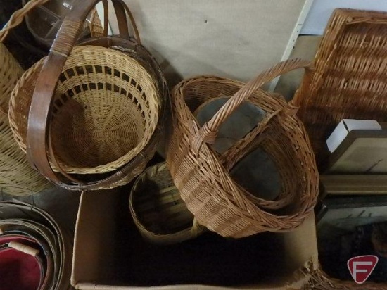 Wicker chest, wicker baskets, and framed pictures