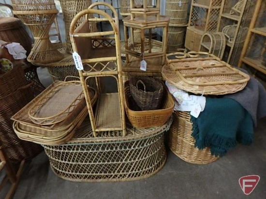 Wicker hamper, blankets, wicker end table, baskets, trays, and plant stands