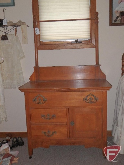 Vintage wood commode dresser with towel bar, 3 drawers and one door, on wheels