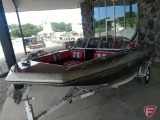 1982 Baja 160BR speedboat with 115HP Johnson outboard, ski pole, and 1982 EZ Loader trailer